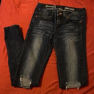 Dark blue ripped jeans